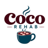 A logo-style graphic with the words 'Coco Rehab' on a white background, above an illustrated dark blue mug of hot cocoa with steam.
